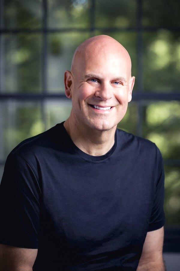 Jeffrey Rediger smiling outdoors