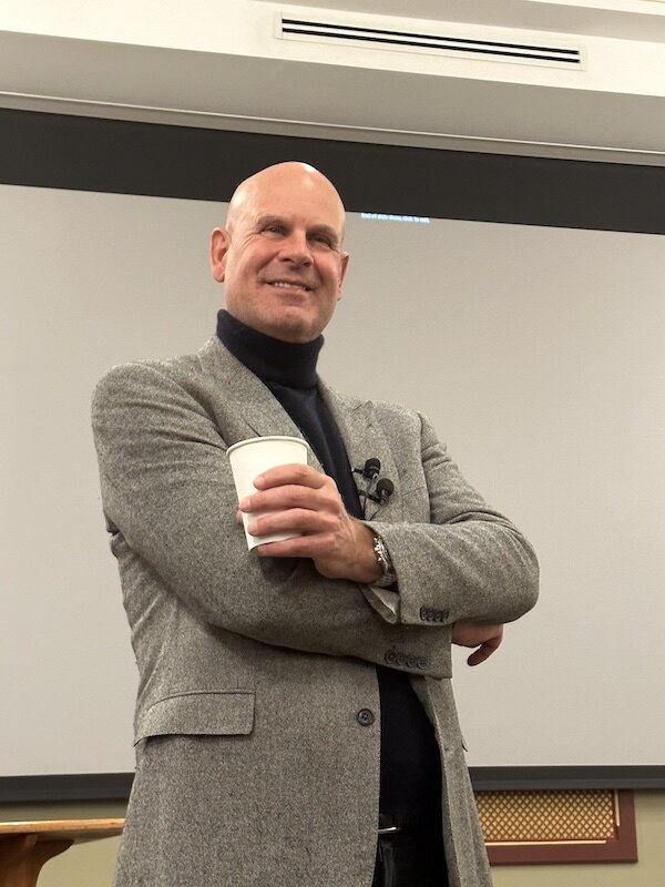Jeffrey Rediger speaking at a lectern